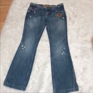 SACRED 28 embroidered destroyed flare jeans